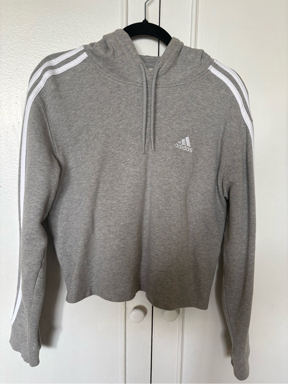 Adidas Women’s Gray Hoodie Sweater with Signature 3-Stripes, cropped top.
